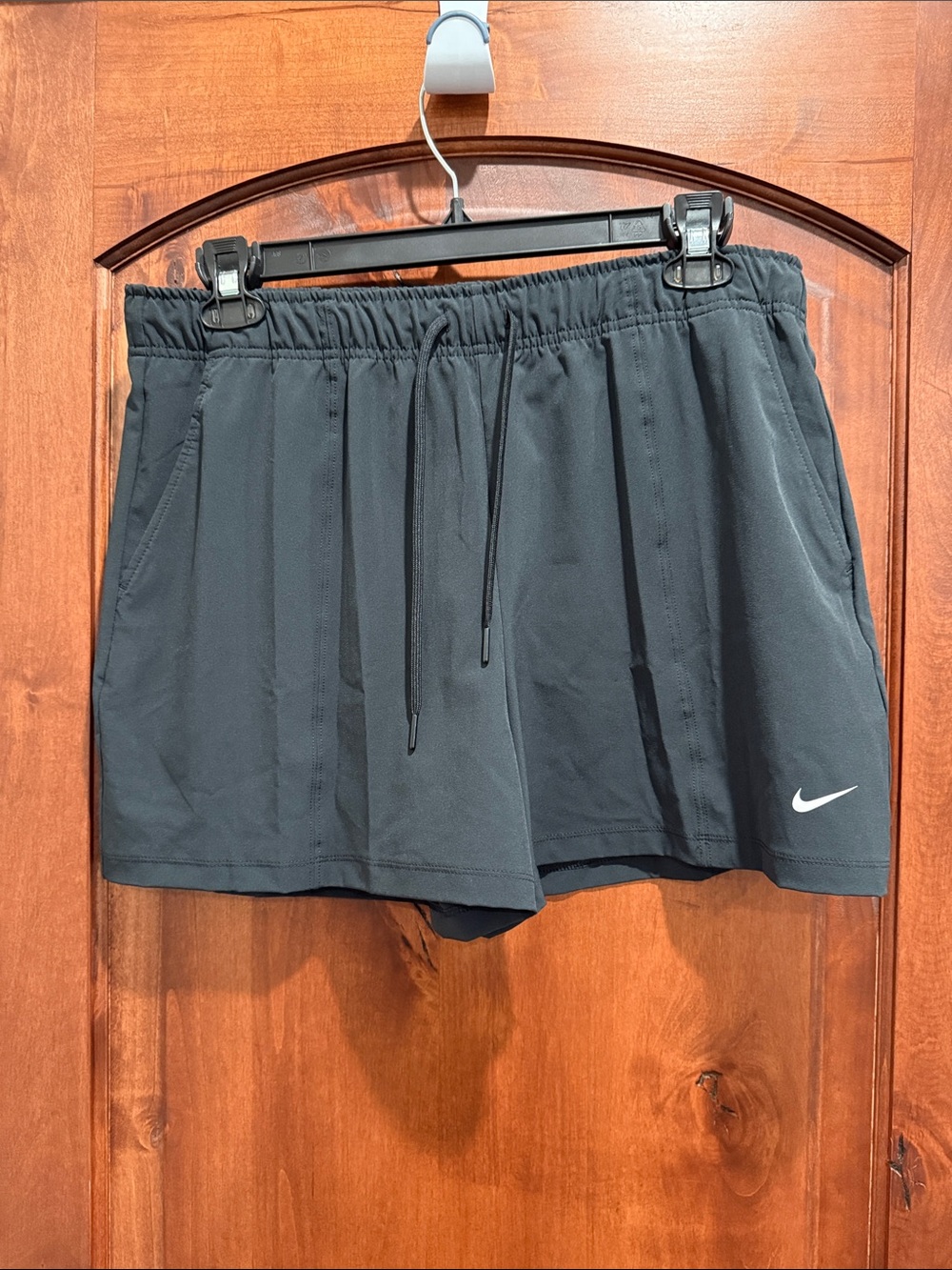 Nike Women's Black Athletic Shorts with White Swoosh